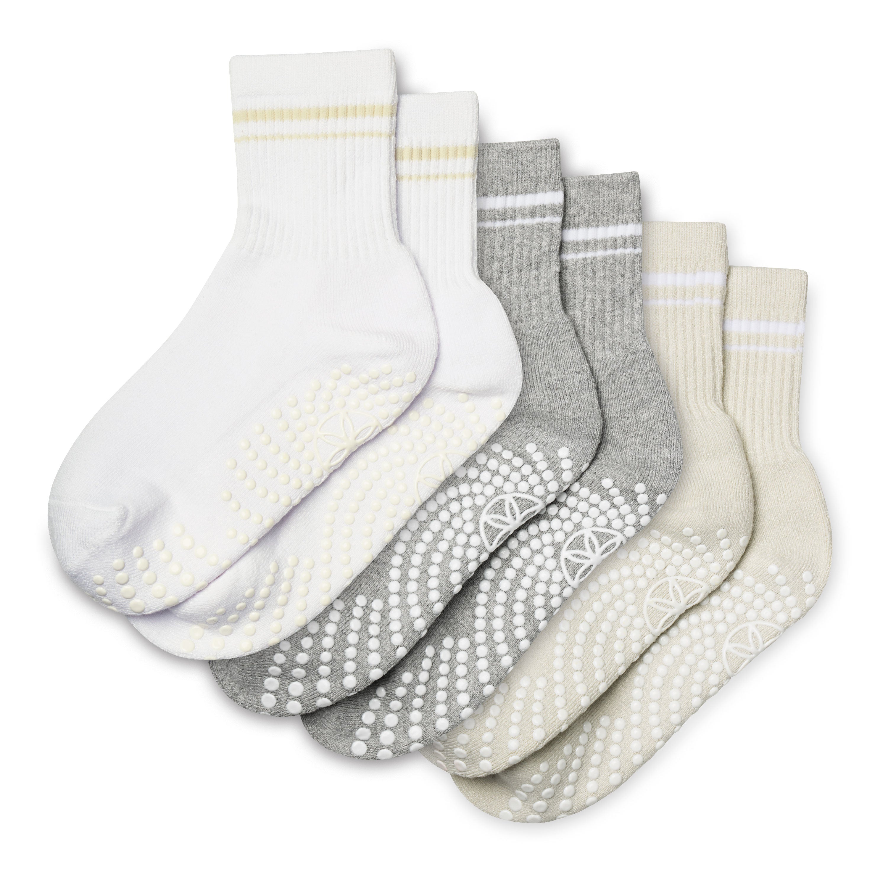 Set of five pairs of socks in white, gray, and beige on a white background